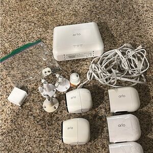 Arlo White Wireless Security Camera System - Base Station & 4 Cameras